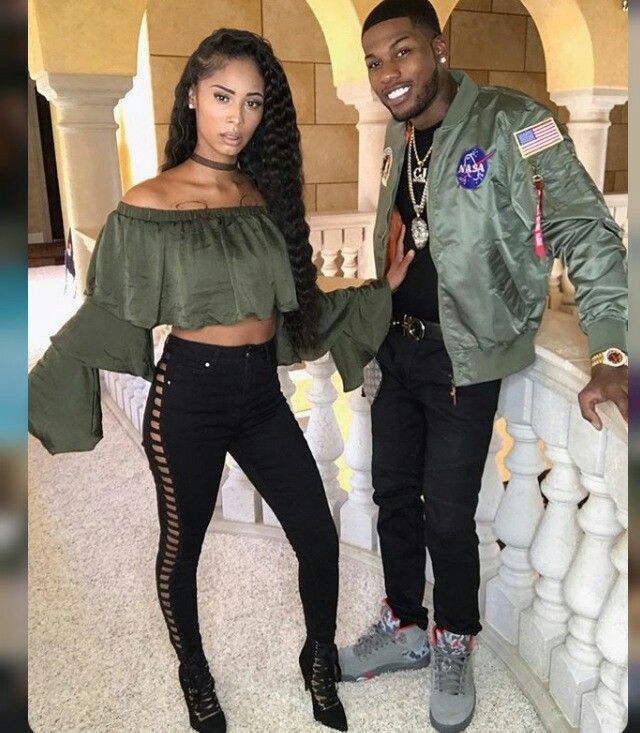 Black couple matching outfits, interpersonal relationship